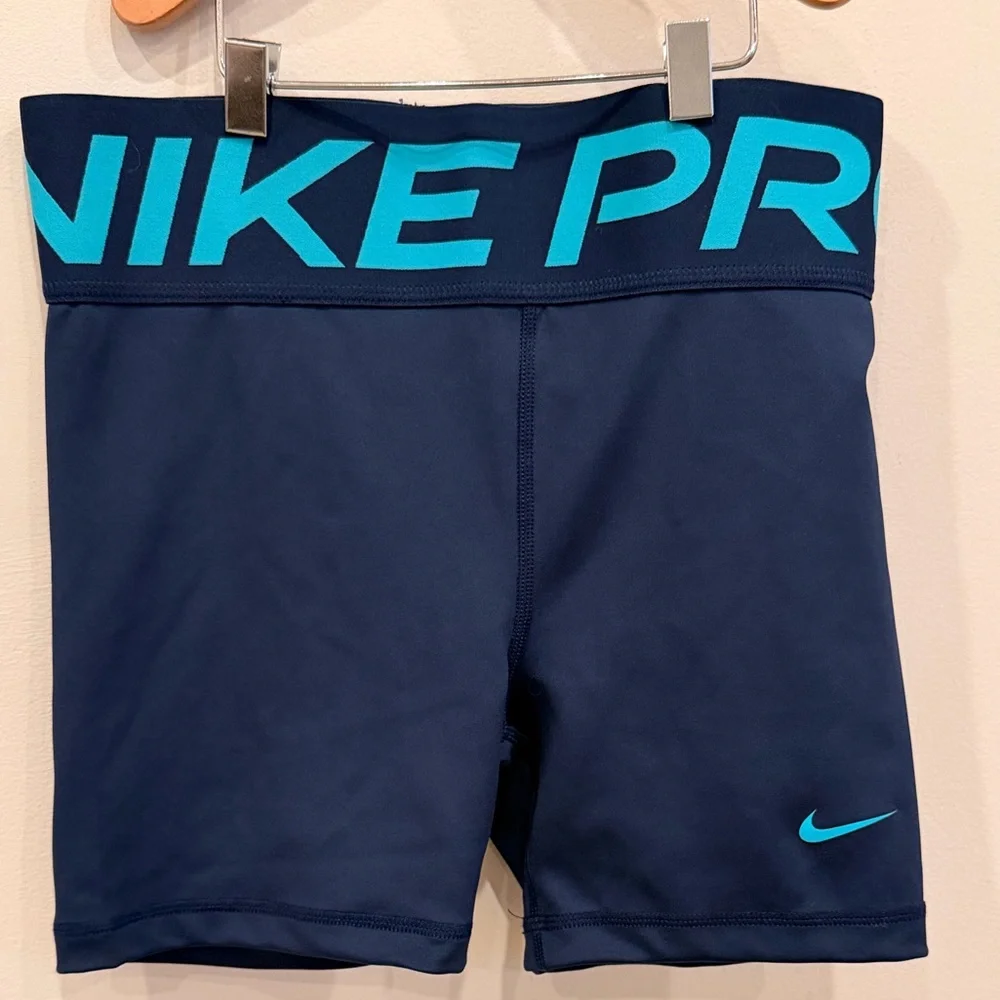 Nike Navy Shorts with Teal Logo and Waistband